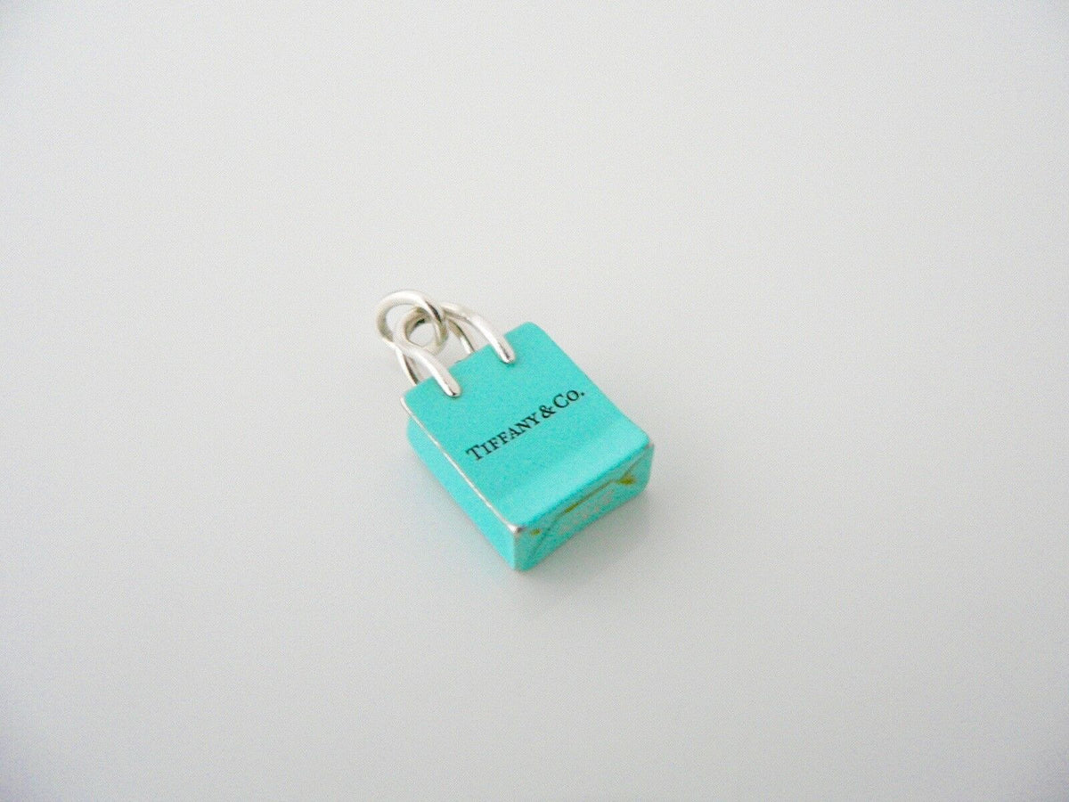 Tiffany & Co.® shopping bag charm in sterling silver with enamel