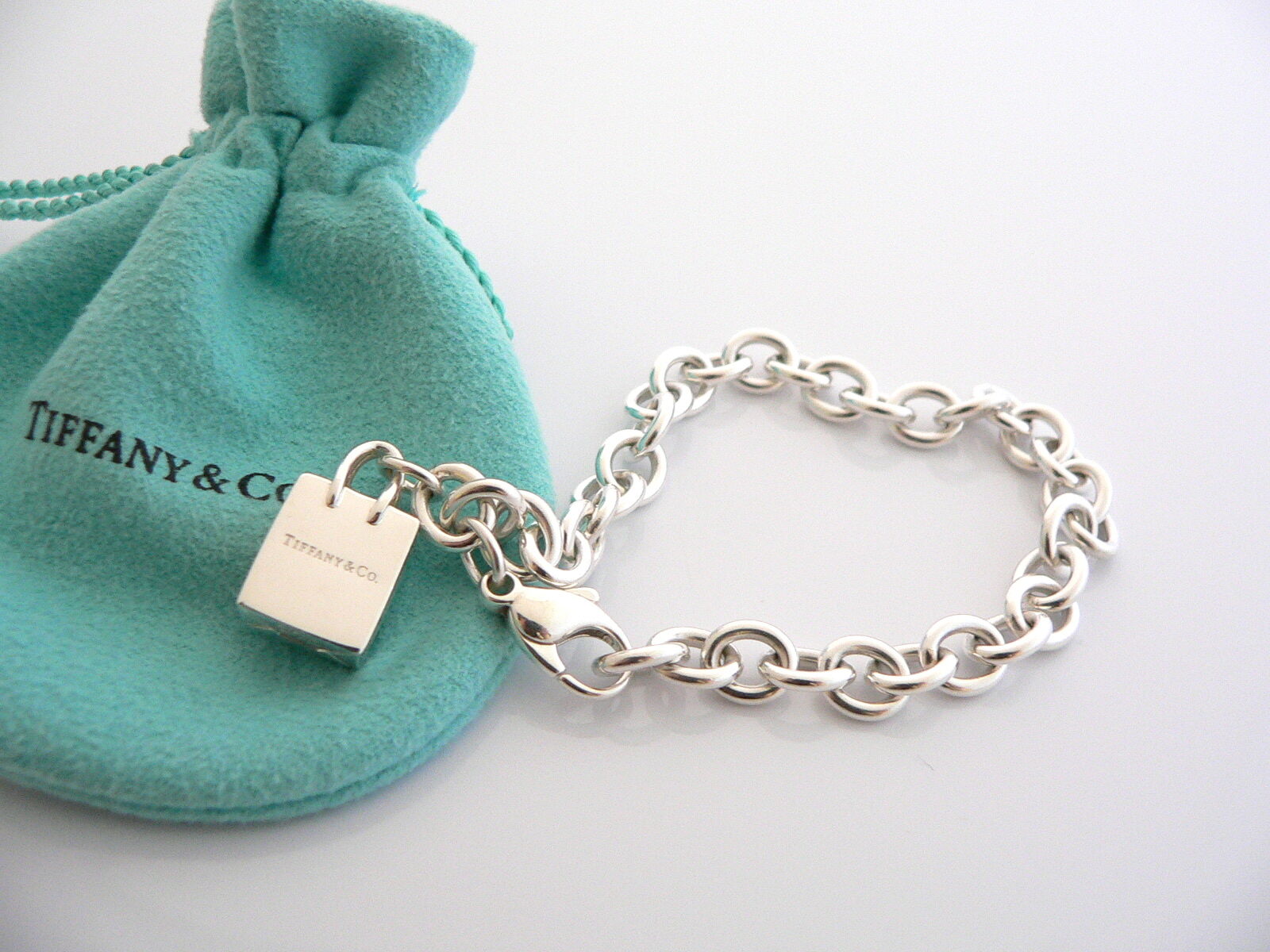 Tiffany & Co Silver Shopping Bag Bracelet Bangle Charm 7.5 Inch Pouch Jewelry