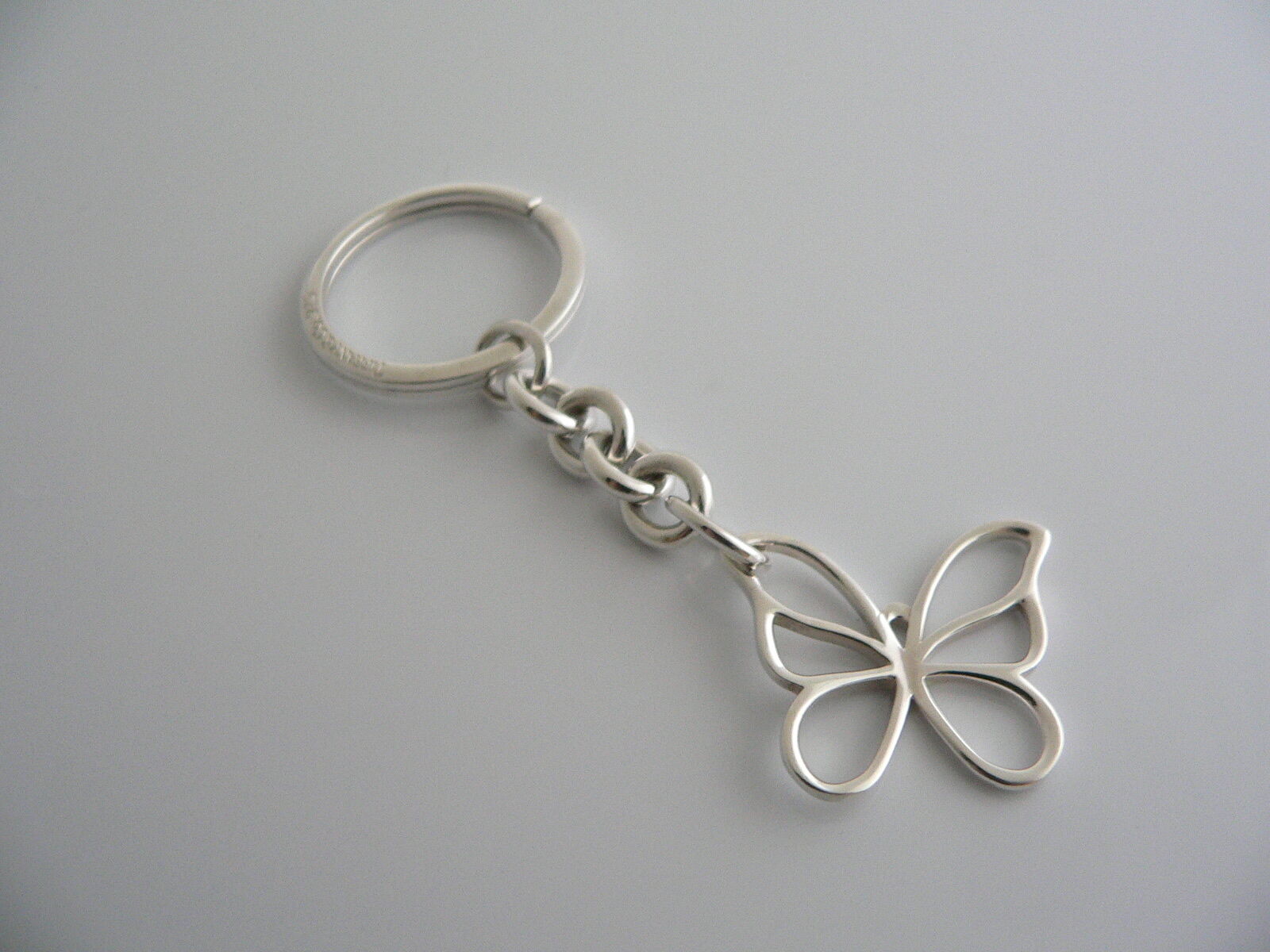 Butterfly Key Rings A sterling silver key ring with a butterfly charm