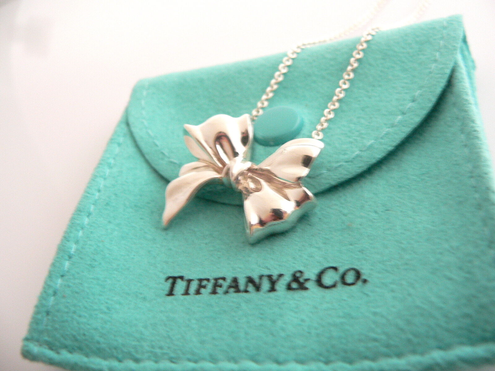 Home › Tiffany & Co Silver Large Ribbon Bow Necklace Pendant 19 inch ...