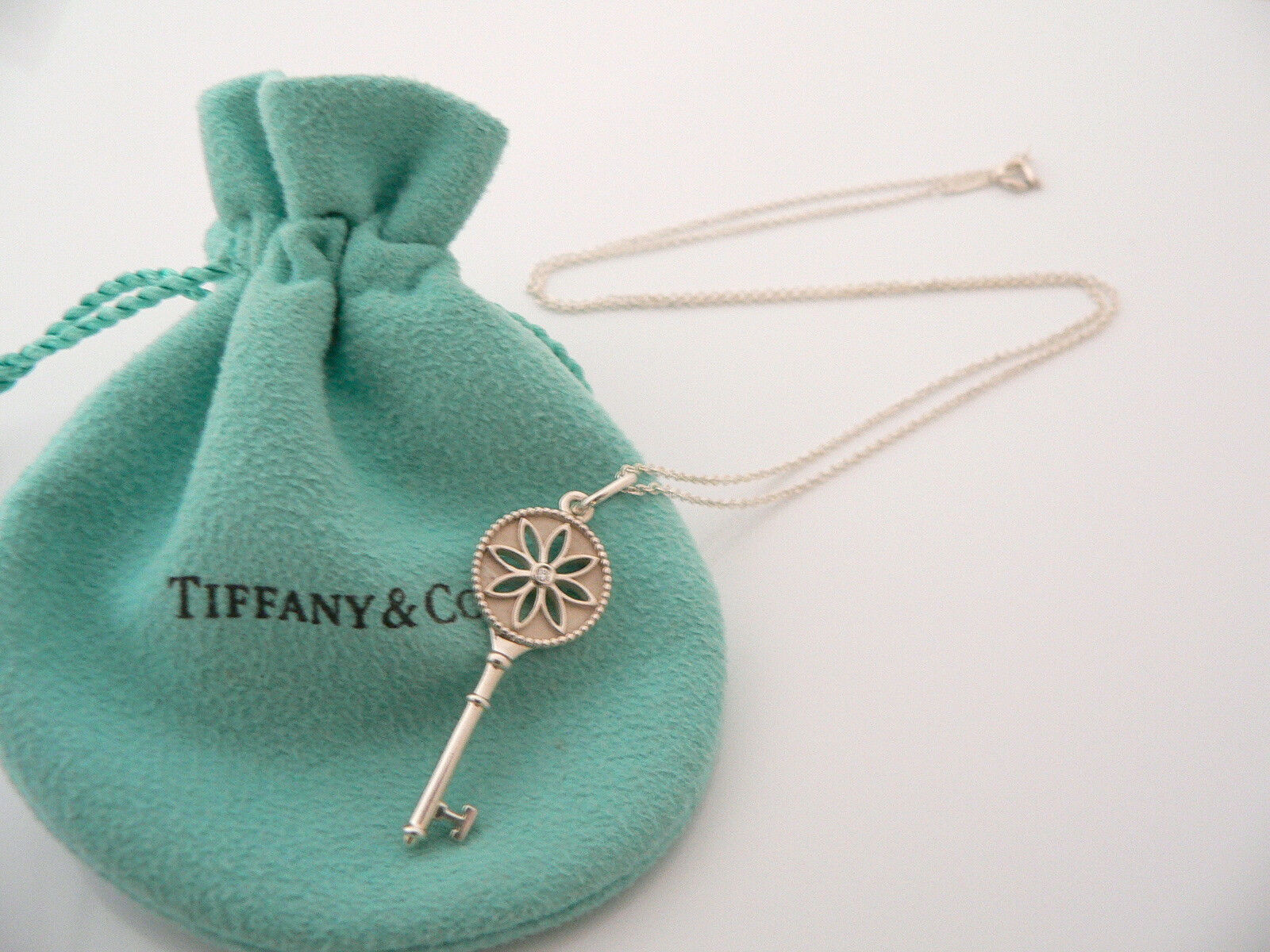 Tiffany daisy key necklace outlet
