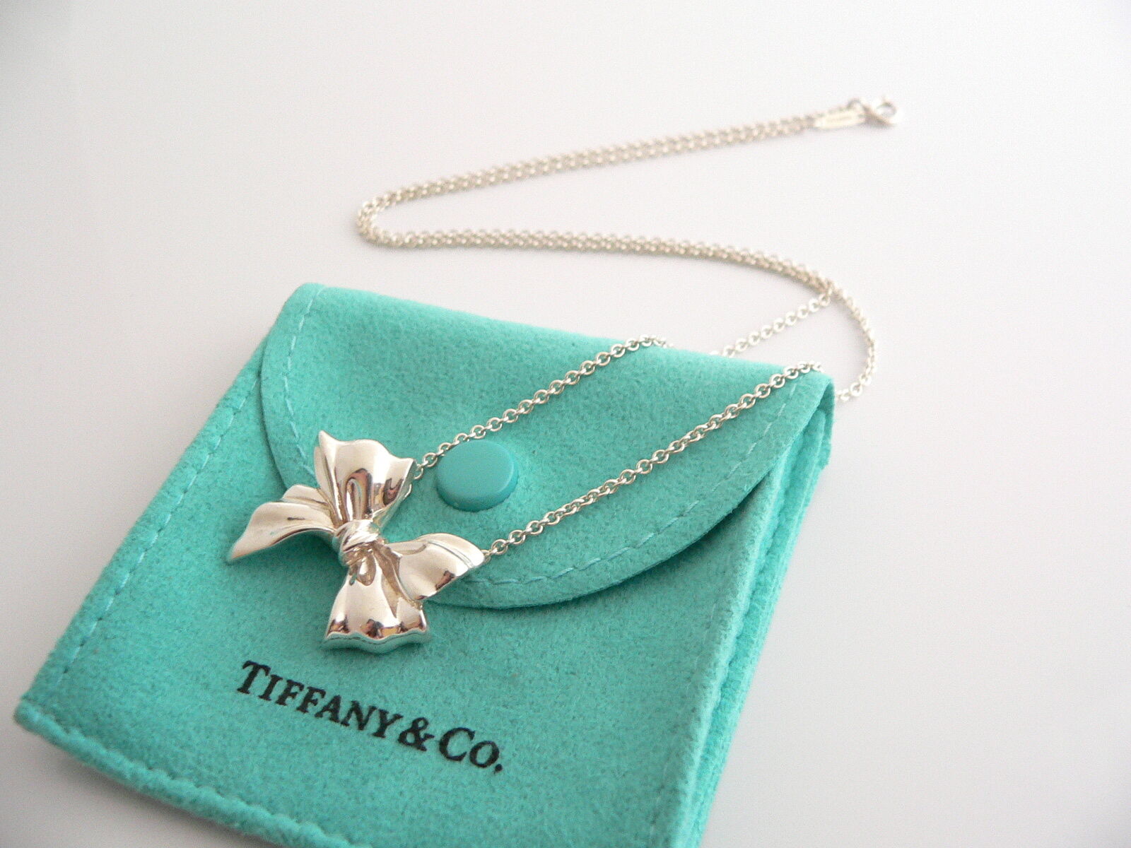 Tiffany & Co  Silver Large Ribbon Bow Necklace Pendant 19 inch Chain Gift Pouch