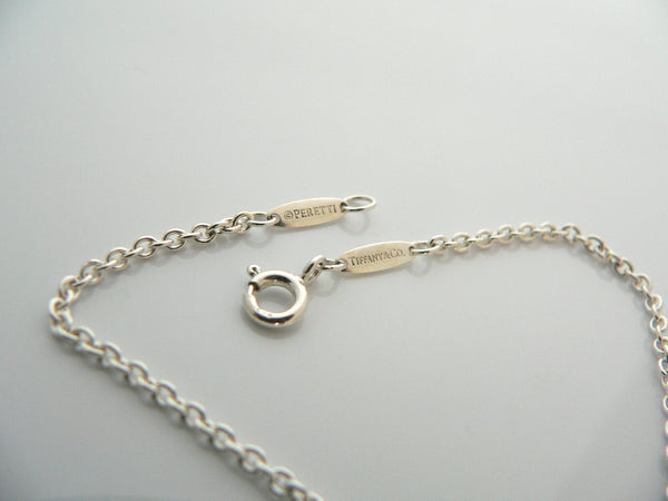 Tiffany & Co Silver Peretti Disc Circle Dangling Dangle Bracelet Bangle 7.25 Inch