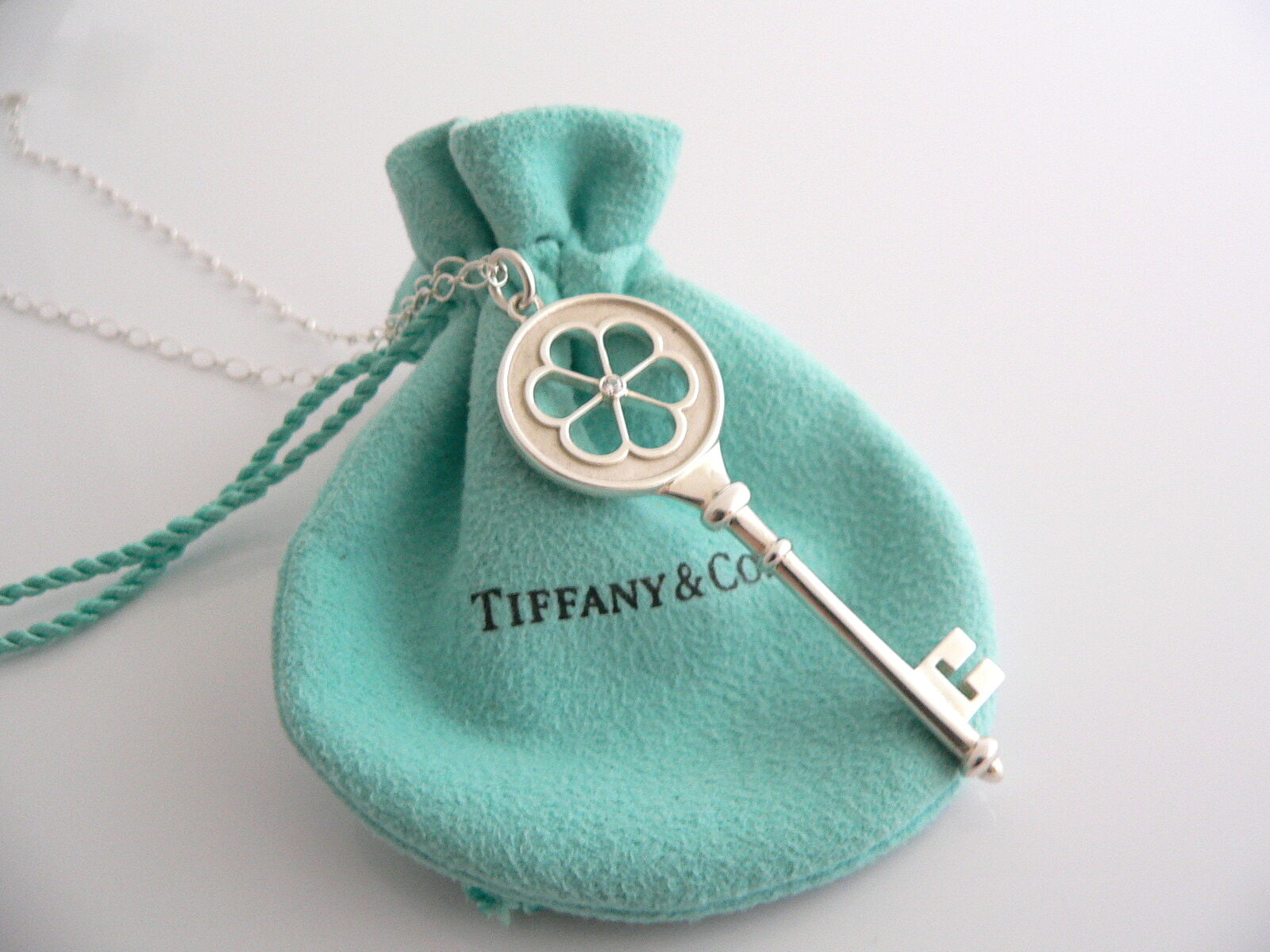 Tiffany Co Silver Diamond Blossom Key Necklace Pendant 24 inch Gift Love Pouch